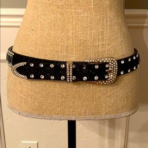 Large black and silver belt with decorative gems